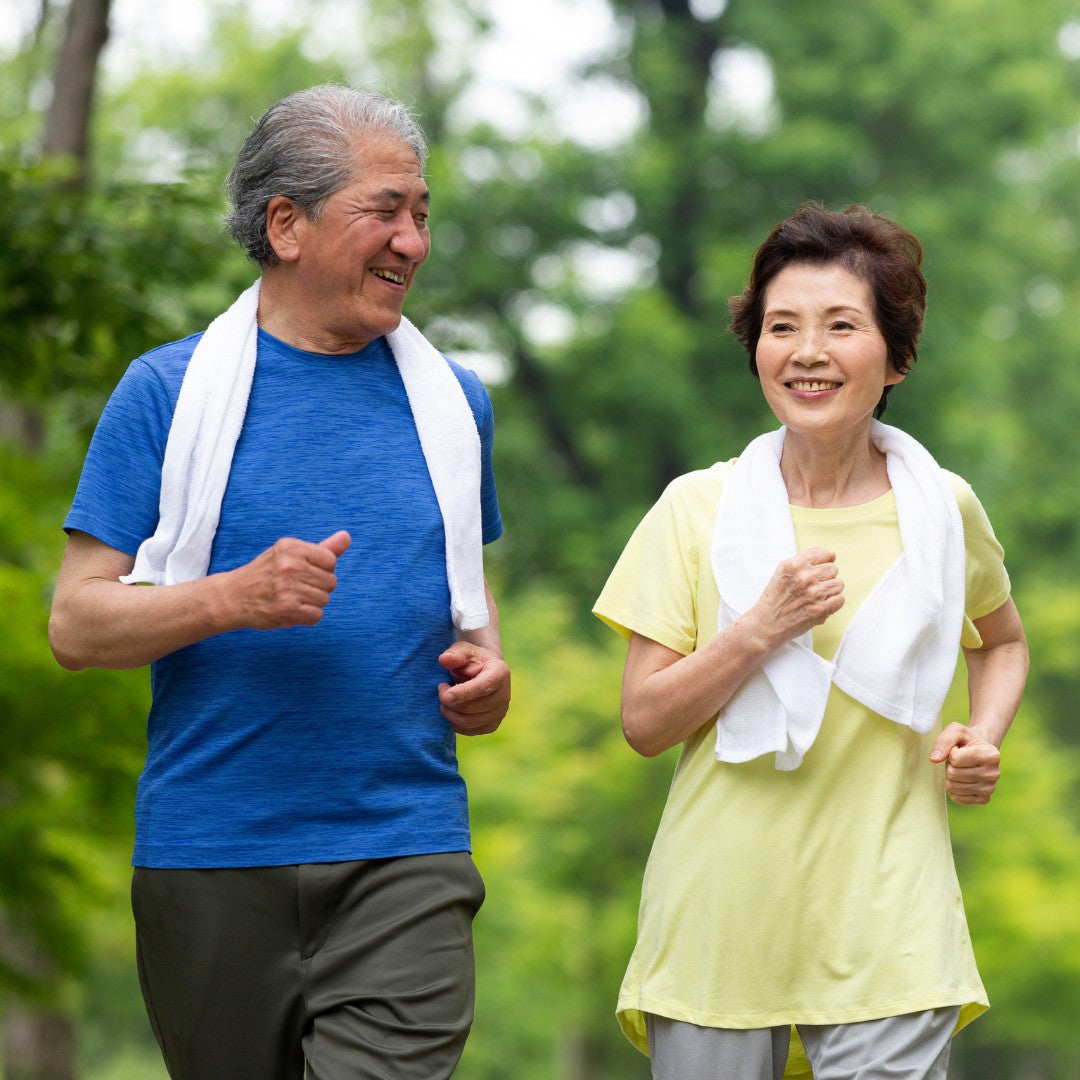 two elderly people going on a walk together