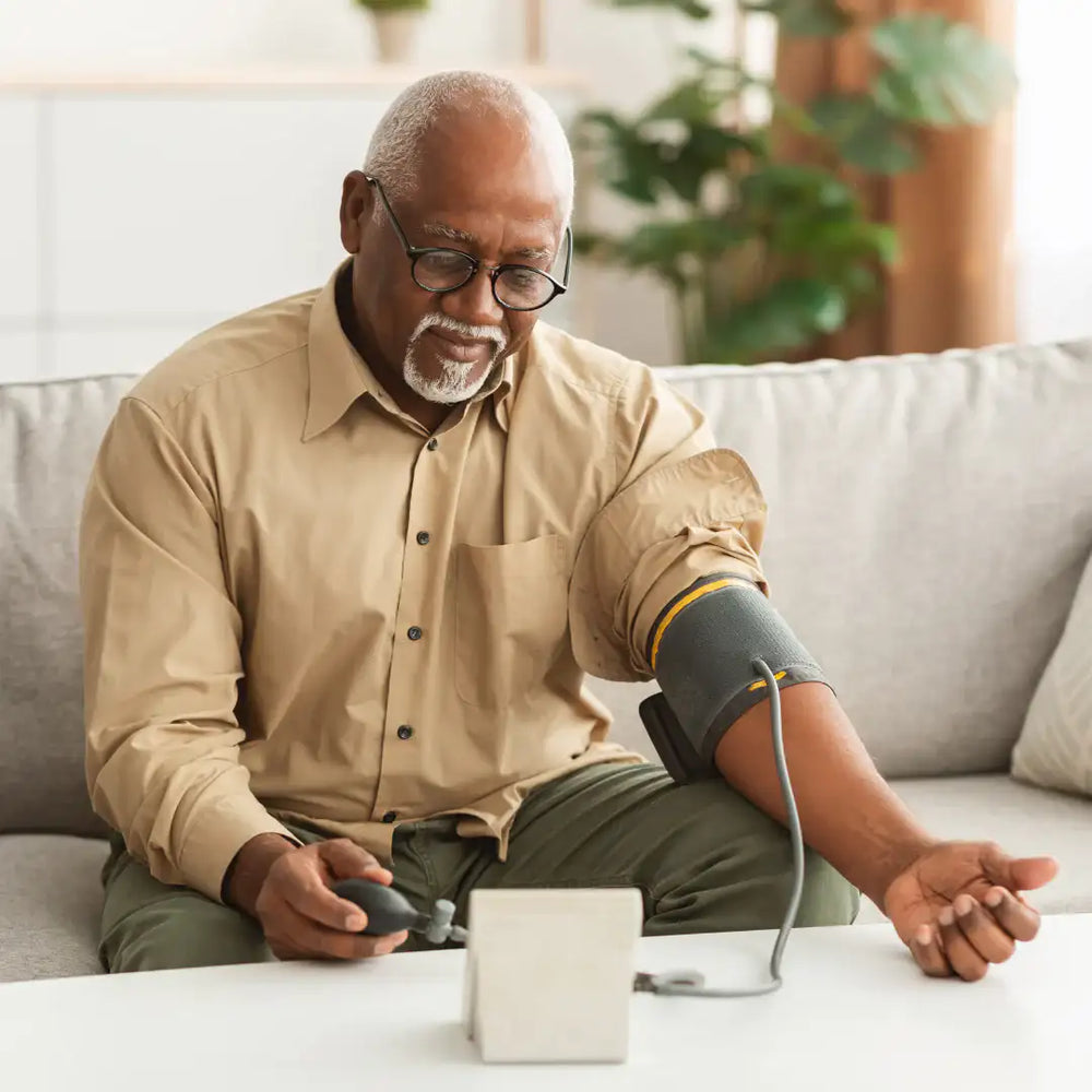 man taking his blood pressure