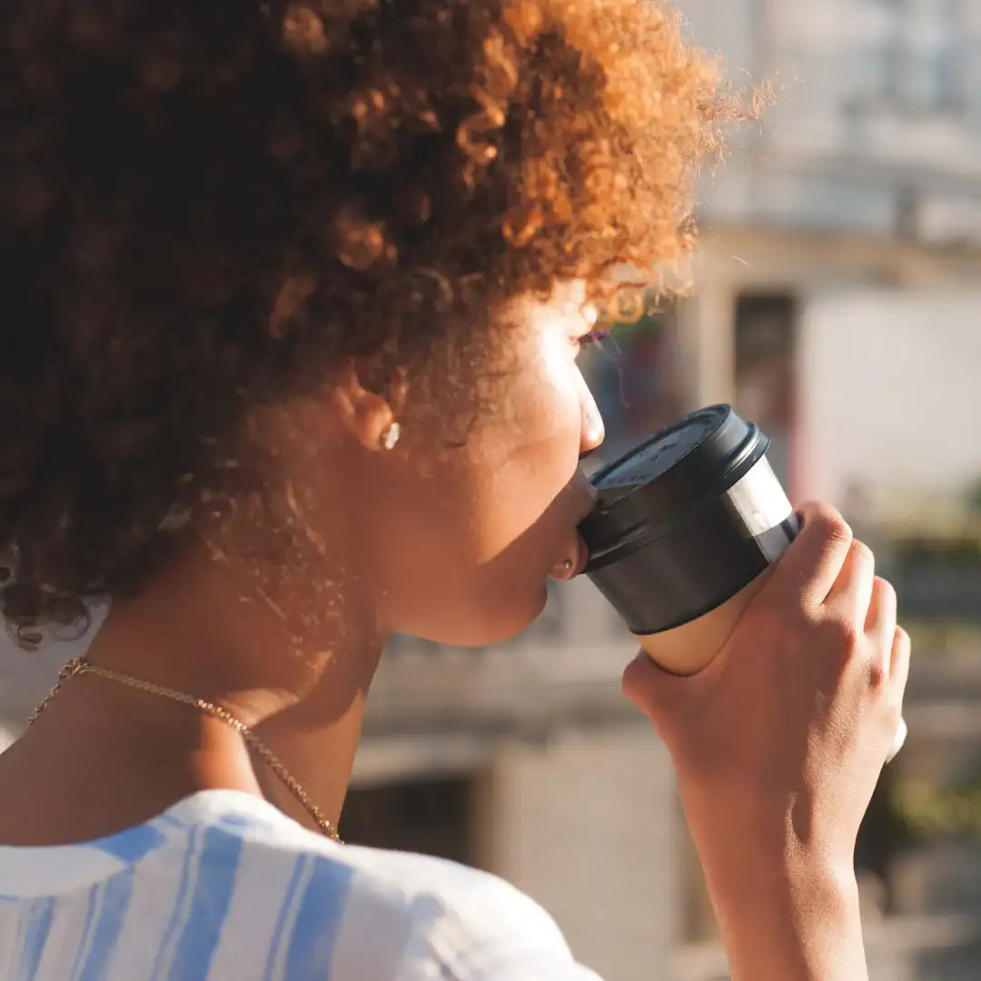 woman drinking coffee