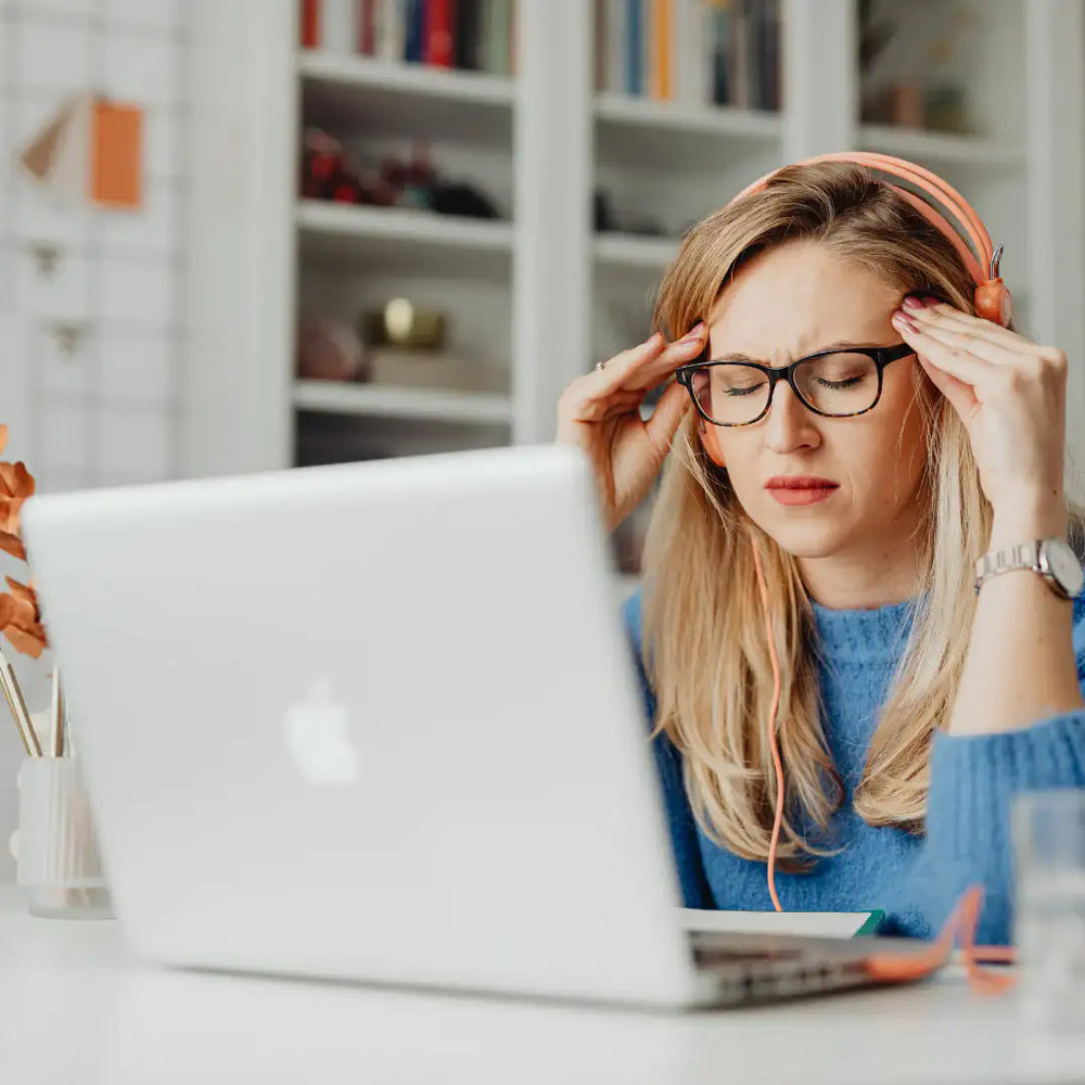 woman experiencing headache