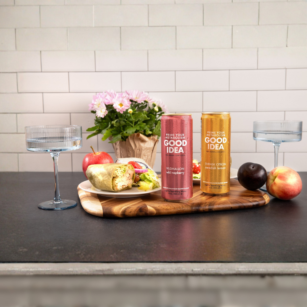 two cans of GOOD IDEA with food on a counter