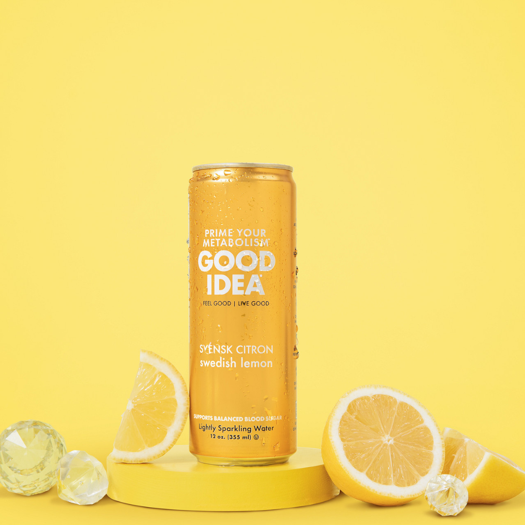 Can of Good Idea Swedish Lemon sparkling water with lemon slices on a yellow background