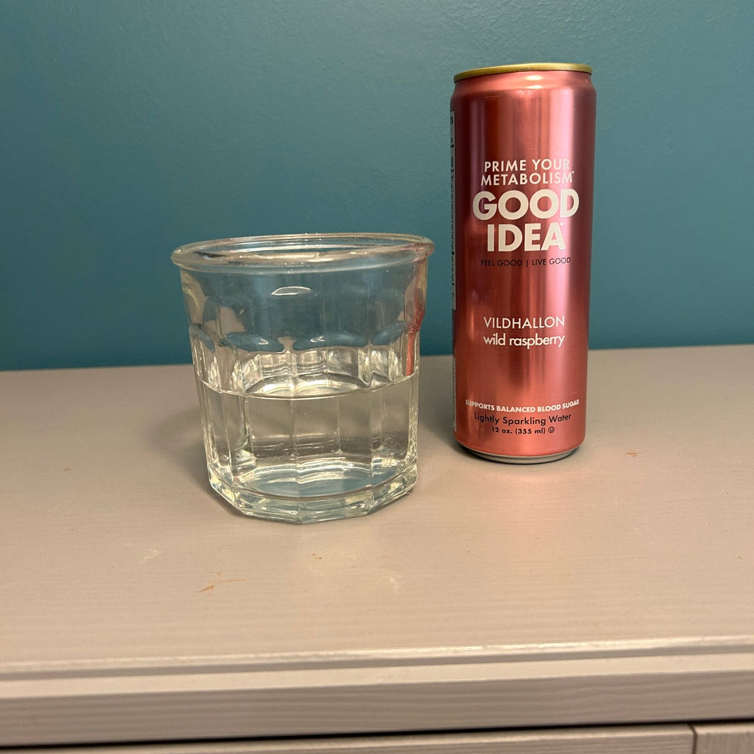 A can of GOOD IDEA Wild Raspberry sparkling water next to a clear glass. Photo from customer review.